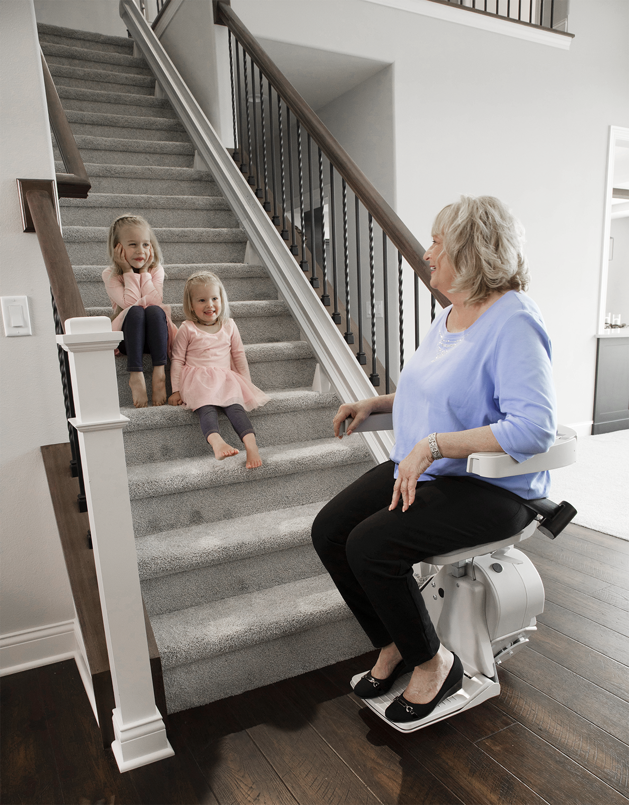 bruno-elan-lady-riding-grandkids-on-steps